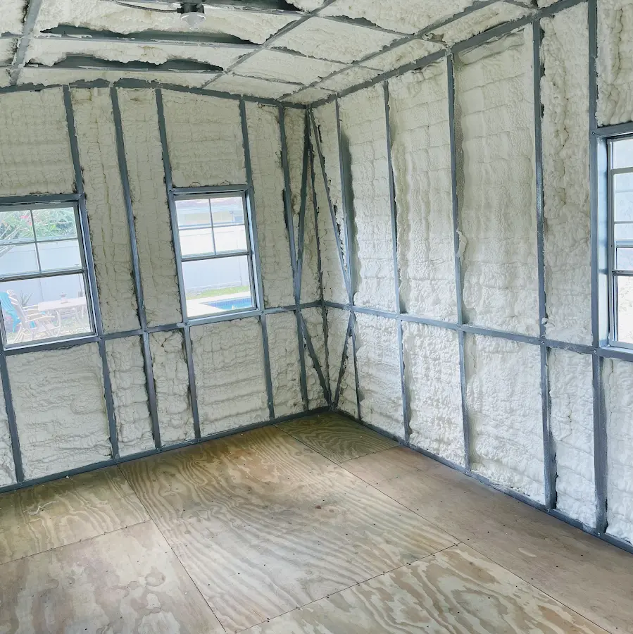 Closed-cell spray foam insulation applied to wall cavities in a residential project in Trenton
